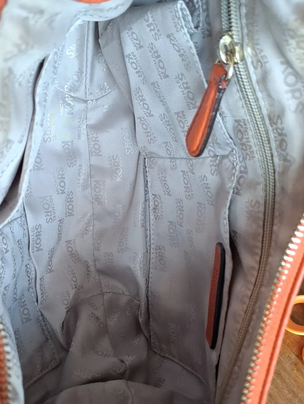 Michael Kors Orange Pebbled Leather Convertible Hobo Bag